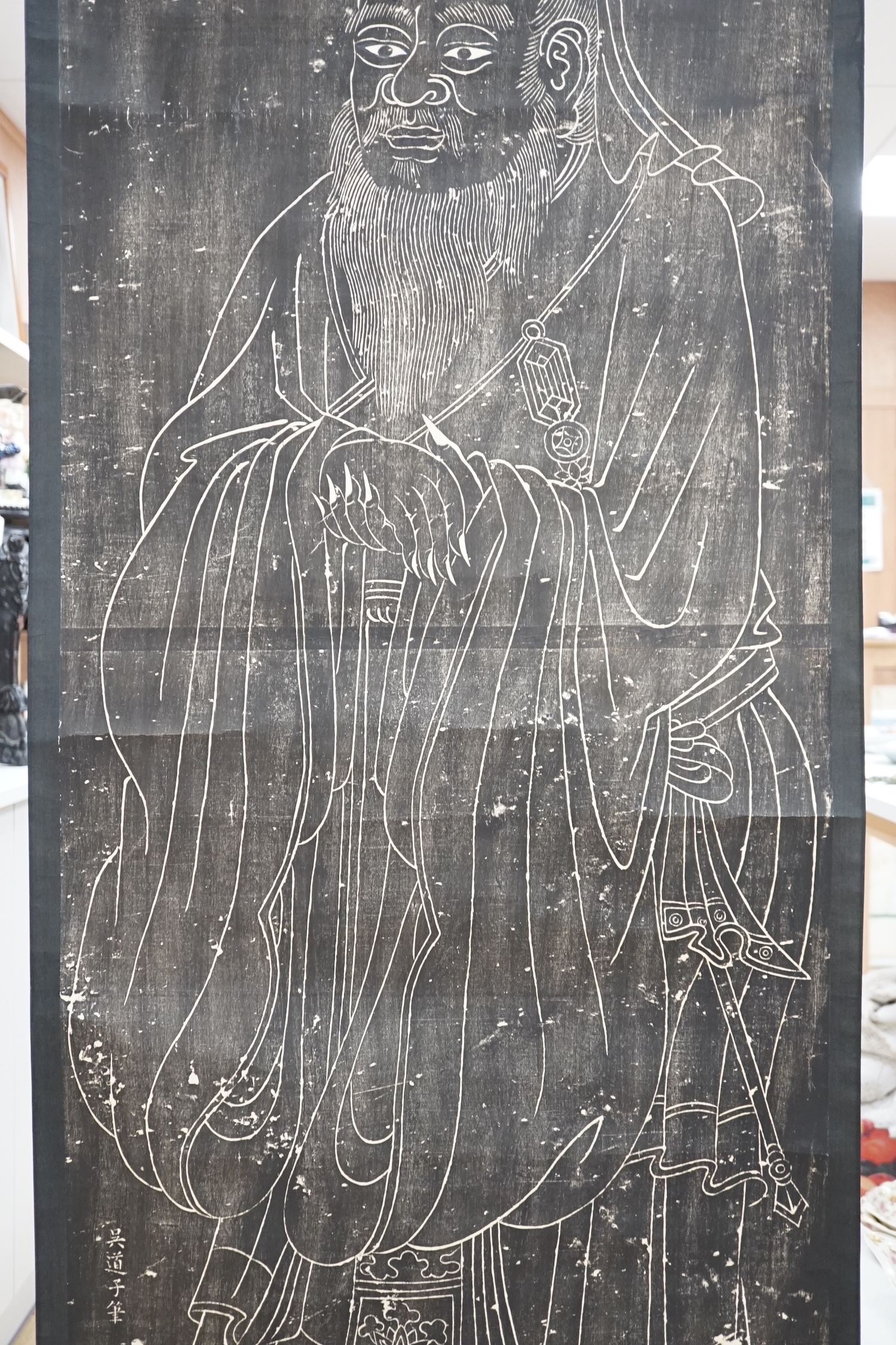 A Chinese scroll painting and scroll rubbing. Condition - poor